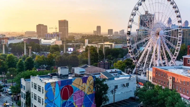 Atlanta Skyline with Ferris Wheel at Sunset - Best Place to Start LLC in Georgia